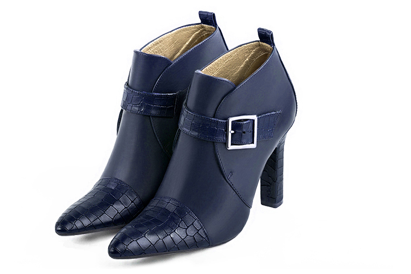 Navy blue women's ankle boots with buckles at the front. Tapered toe. Very high kitten heels. Front view - Florence KOOIJMAN